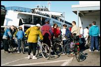 MA, Woodshole, Bicyclists geeting on Ferry